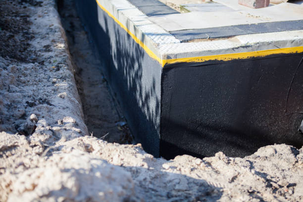 Professional Waterproofing technician working in Fallston, MD